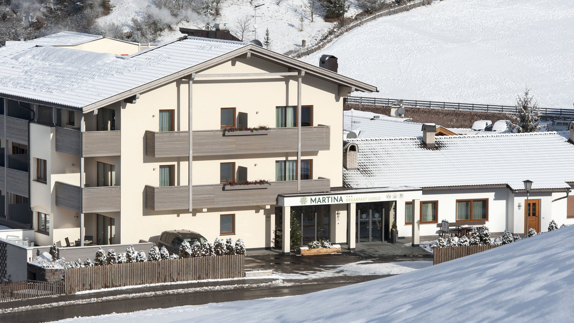 Flexibility at our hotel in Kastelruth Martina lodge in a snowy mountain village in winter