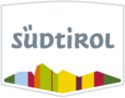 Südtirol Logo mit bunten Bergformen